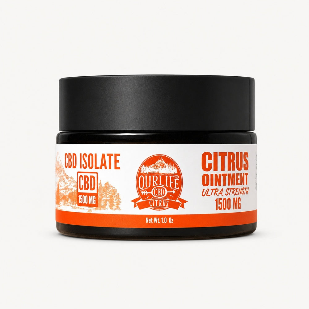 Jar of CBD isolate citrus ointment with black lid on a white background