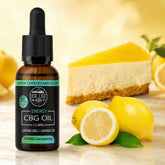 Bottle of CBG oil with lemons and cheesecake on a wooden surface