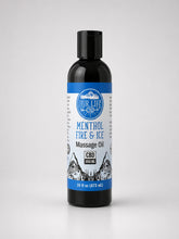 A 16 fl oz black bottle of Our Life CBD Menthol Fire & Ice Massage Oil with a blue and white label, set against a light gray background.