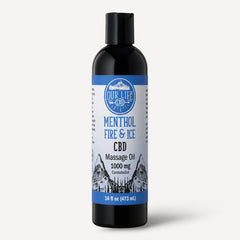 CBD massage oil bottle with label on a white background