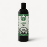 CBD massage oil bottle with label on a white background