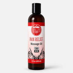 Bottle of Pain Relief Massage Oil with a red label on a white background