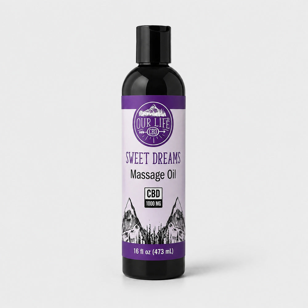 A 16 fl oz black bottle of Our Life CBD Sweet Dreams Massage Oil with a purple and white label, set against a light gray background.