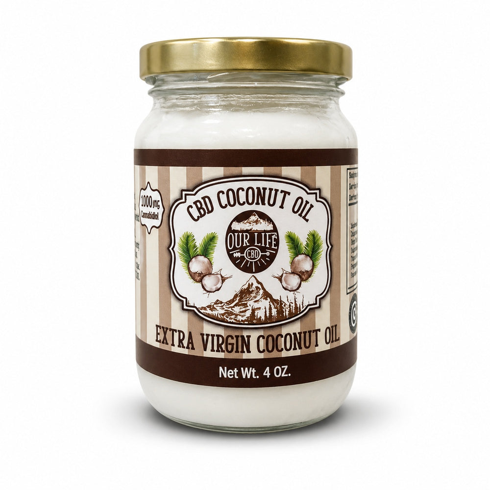 Jar of CBD coconut oil with a gold lid on a white background
