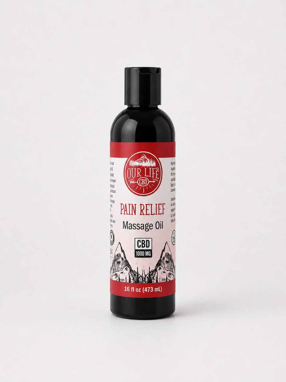 A bottle of Our Life CBD Pain Relief Massage Oil on a light gray background. The bottle is black with a black cap and features a white and red label with a mountain graphic.