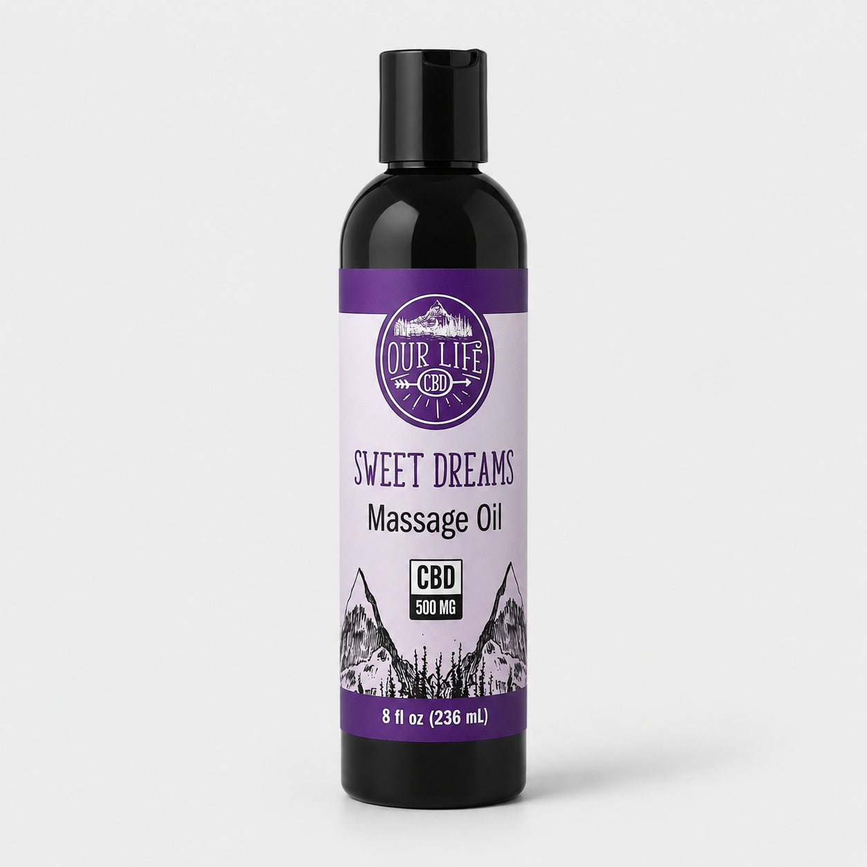 Bottle of 'Sweet Dreams' massage oil with a purple label on a white background