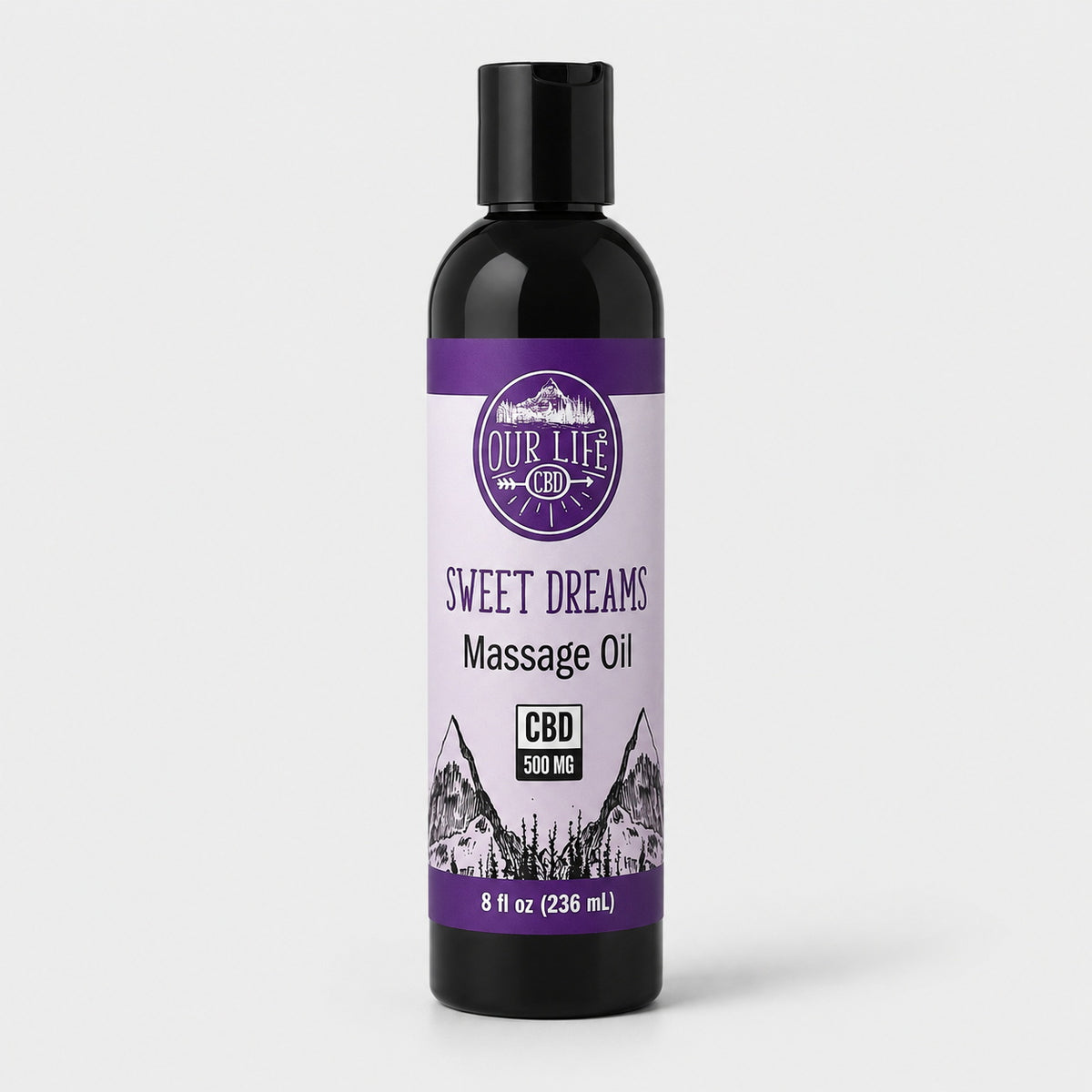 Bottle of 'Sweet Dreams' massage oil with a purple label on a white background